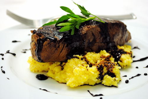 Seared Steak over Soft Polenta w/ a Fig Balsamic Reduction